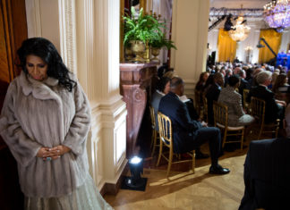 Aretha Franklin prepares to perform during "The Gospel Tradition: In Performance at the White House" in the East Room of the White House, April 14, 2015. (Official White House Photo by Pete Souza)